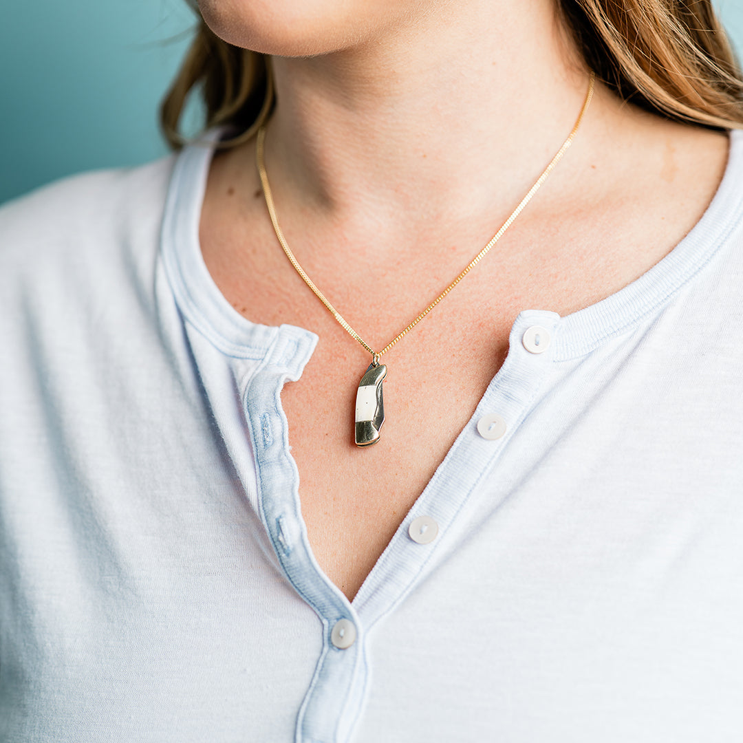 Small Bone Handled Knife on Short Gold Chain Necklace