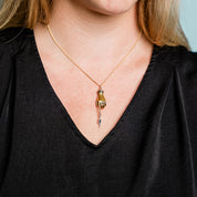Magicians Hand on Gold Chain Necklace